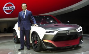 Carlos Ghosn and the Nissan IDx NISMO at the 2013 Tokyo Motor Show