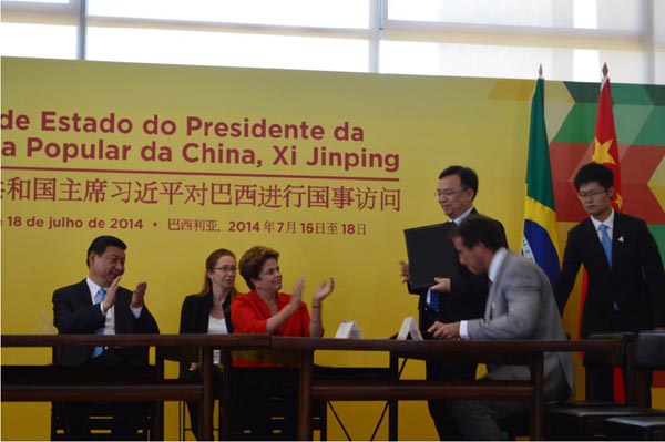 Pictured above: Presidents Xi and Rousseff congratulate BYD’s Wang Chuanfu