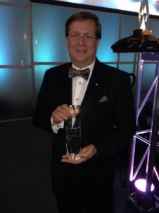 Toyota North America CEO Jim Lentz receives the Industry Leader of the Year award at the Automotive Hall of Fame Induction & Awards Gala Ceremony in Detroit, Mich., July 24, 2014.