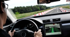 Passing through a construction site and display of the instrument cluster with red marked hazard area